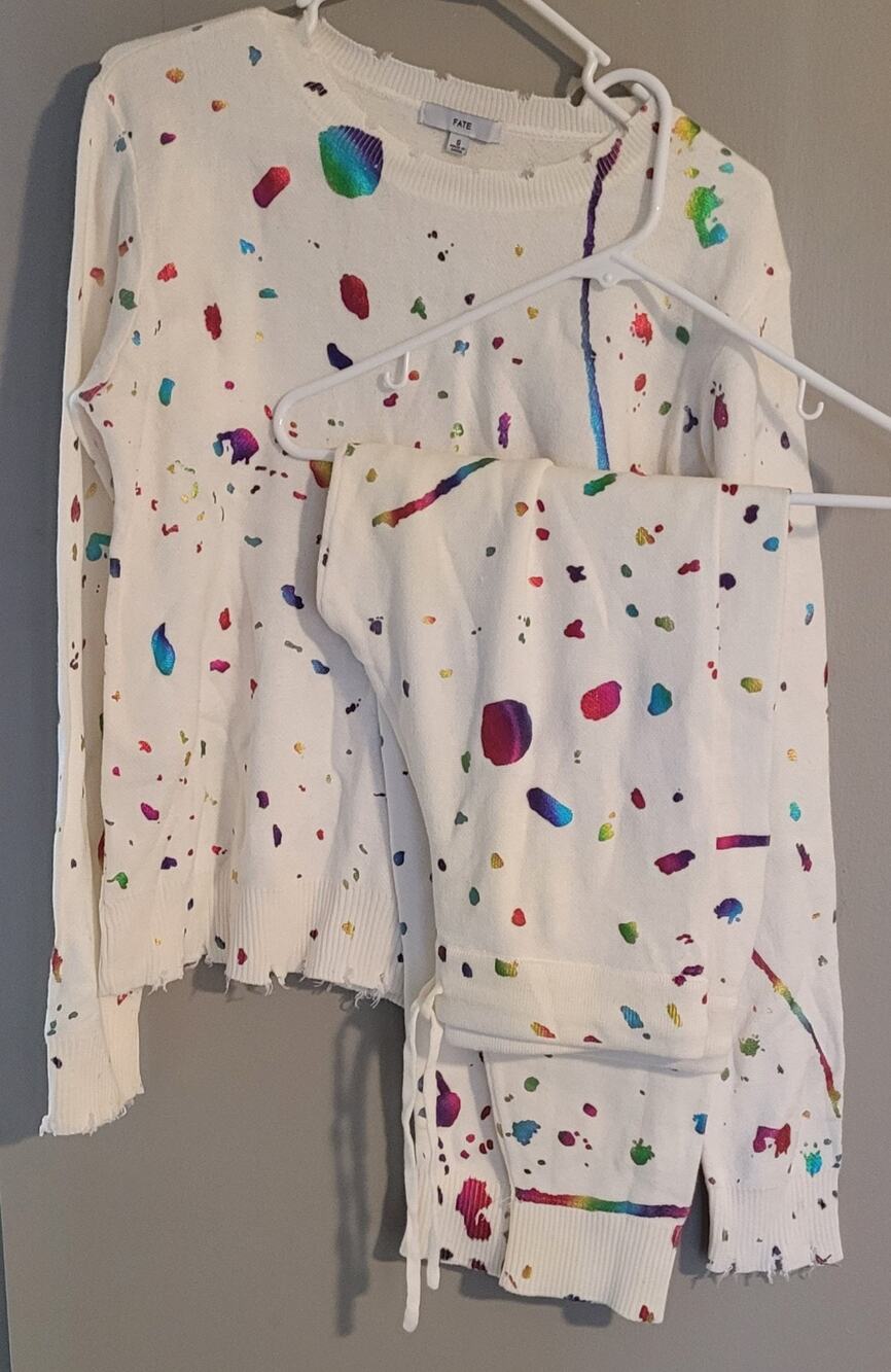 Women's 2 piece pajamas top is small bottoms are Large by FATE